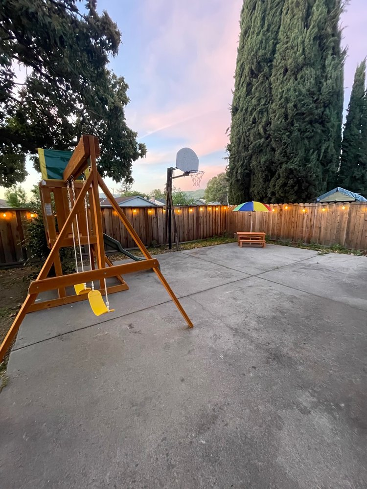Backyard at sunset with string lights